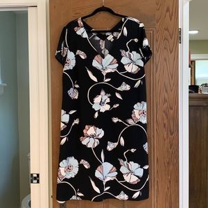 Black dress with flowers.  Never worn.  Size “L”